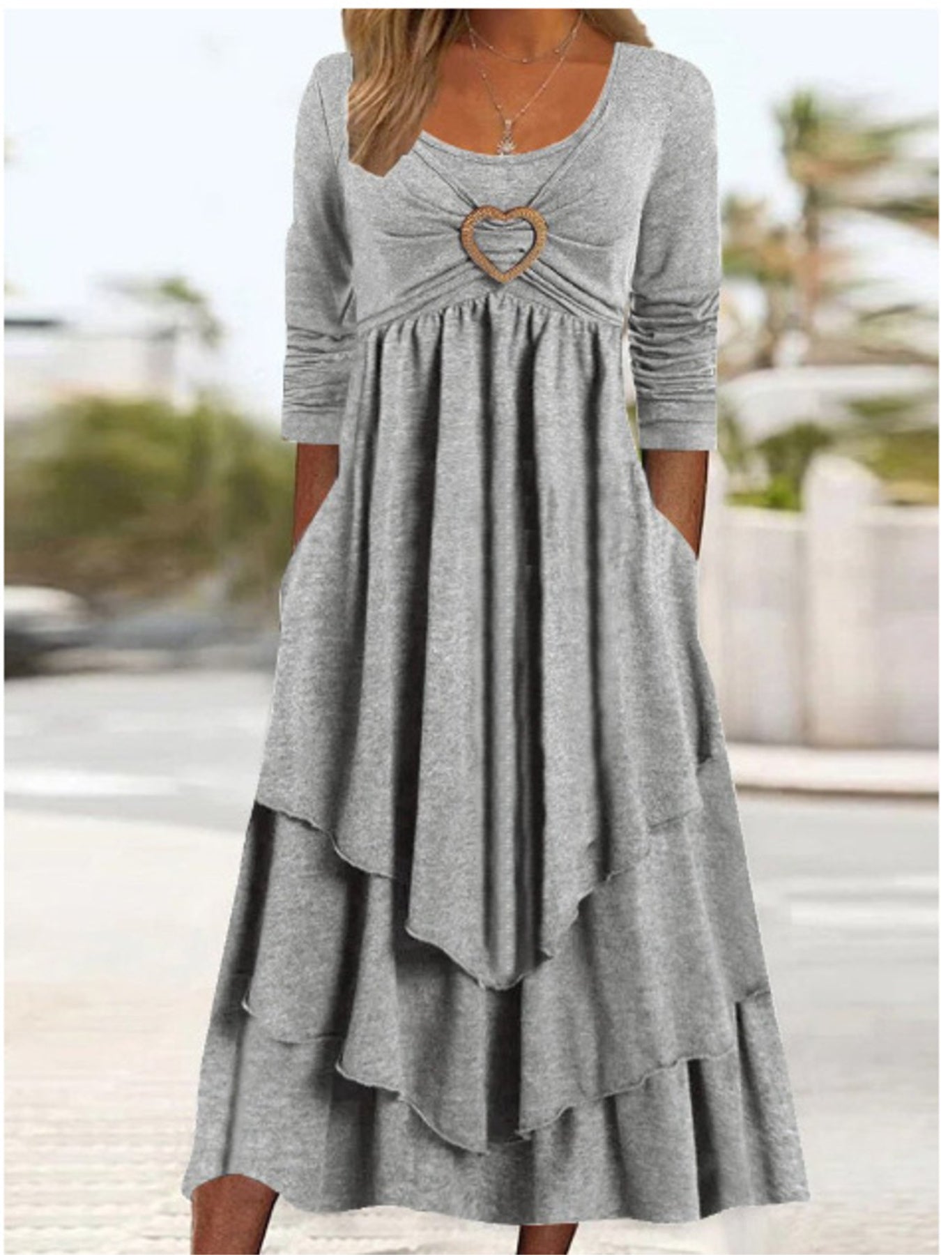 Light gray long sleeve midi dress with heart detail and tiered skirt