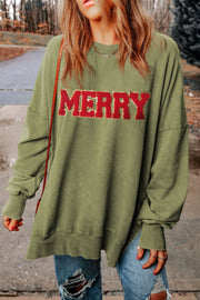 Moss green sweatshirt with red "MERRY" appliqué, crewneck, and side slits.