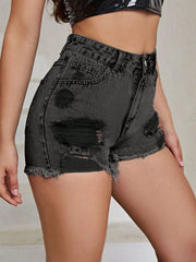 Distressed denim shorts in gray with frayed hem and ripped details.