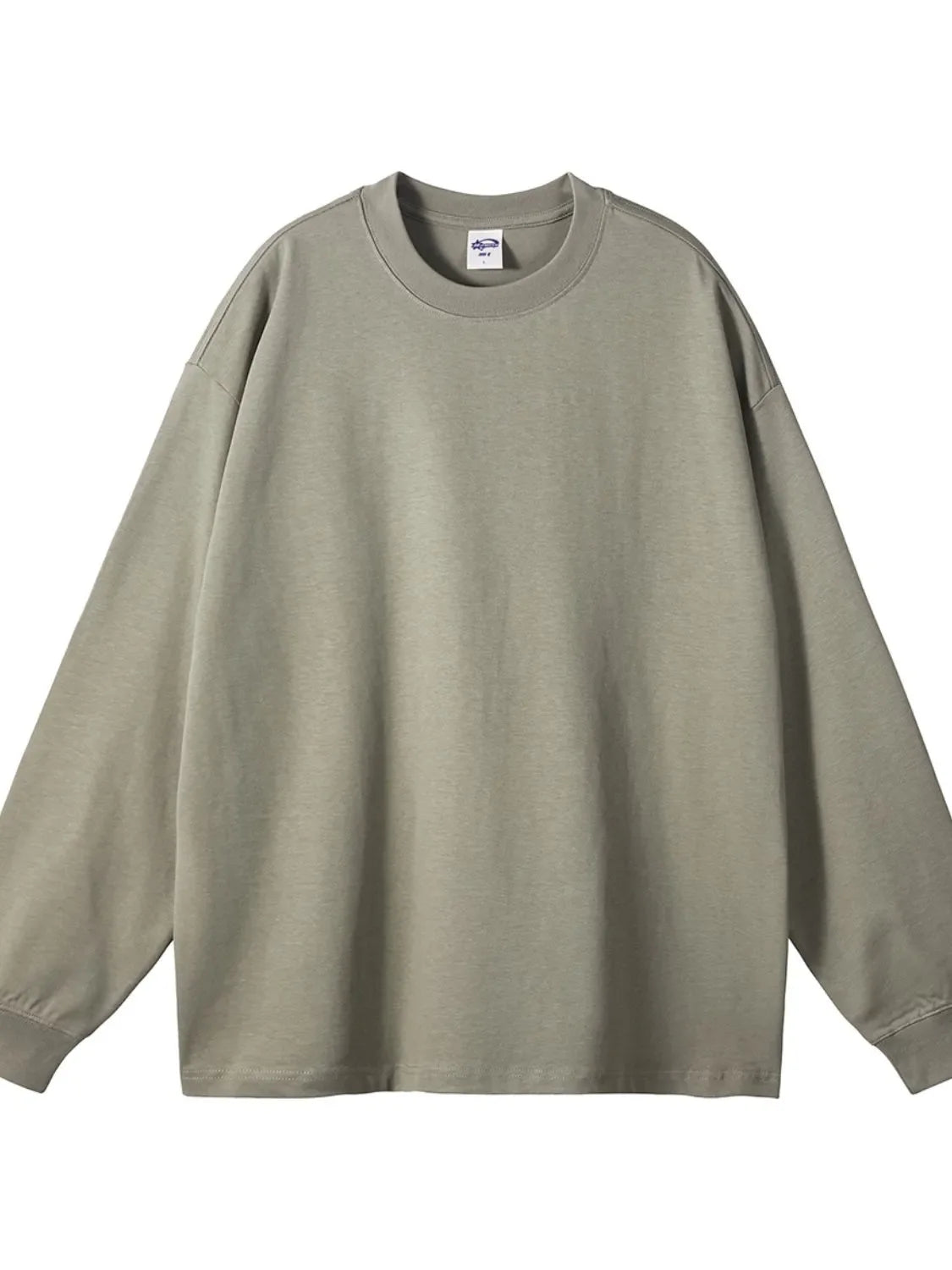 Oversized drop-shoulder crewneck pullover in sage green 100% cotton with long sleeves.