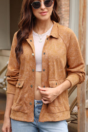 Caramel washed cotton utility jacket with snap button pockets and collar.