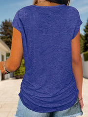 Violet cap-sleeve tee with ruched sides and a curved hem.