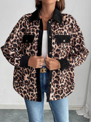 Leopard corduroy utility shirt jacket with black accents and button front.