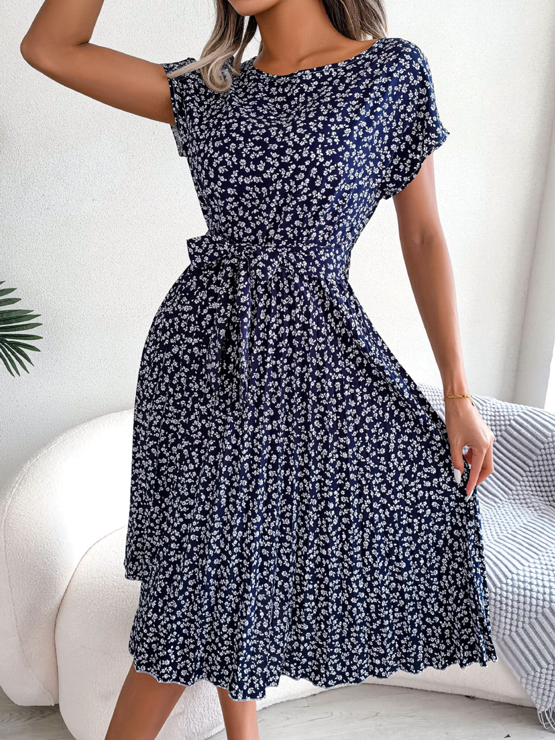Navy floral print midi dress with tie waist and short sleeves
