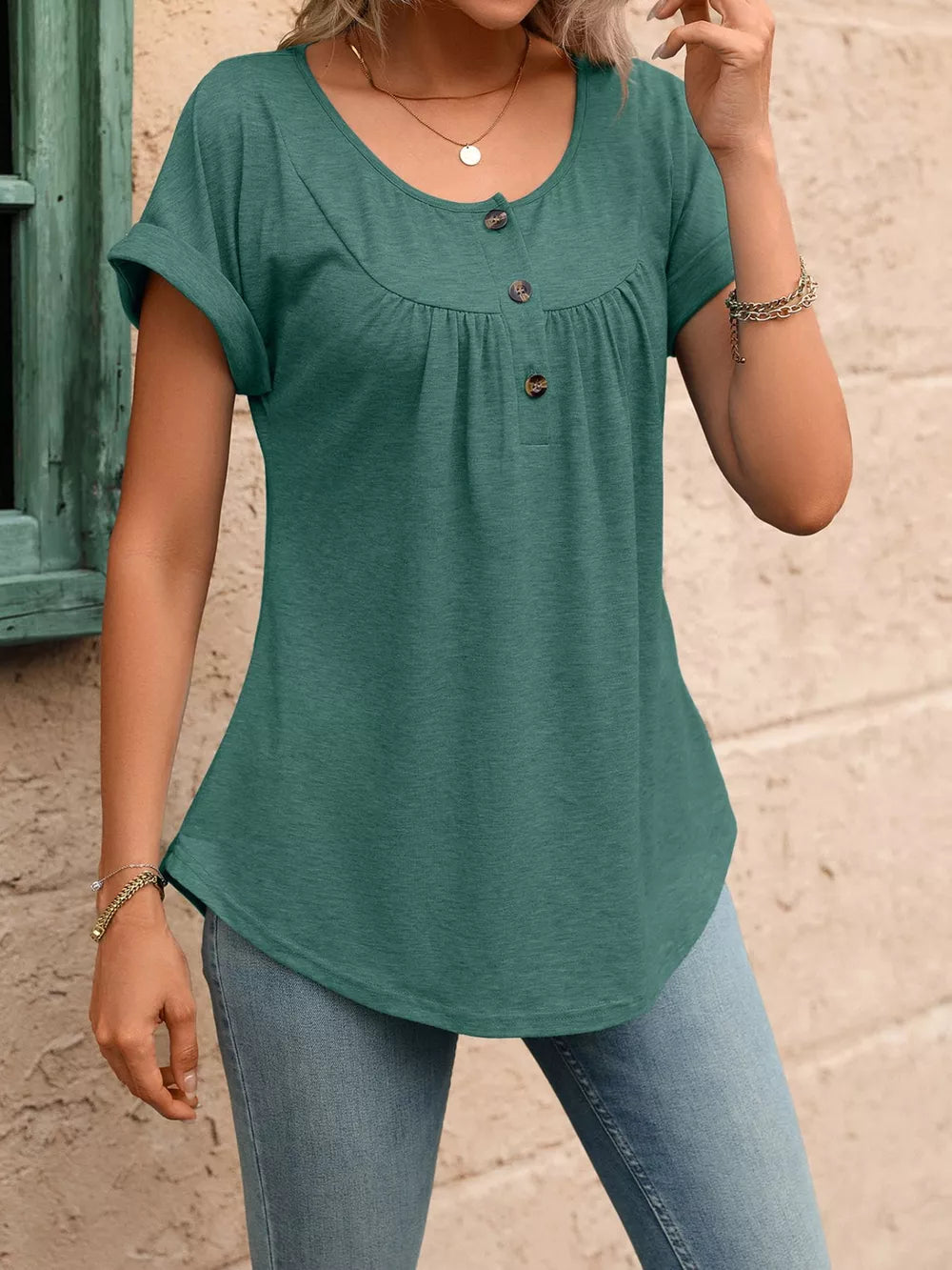Sage relaxed henley t-shirt with button detail and cuffed short sleeves.