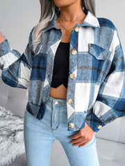 Oversized blue tartan shacket with patch pockets and button front.