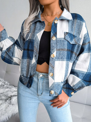 Oversized blue tartan shacket with patch pockets and button front.
