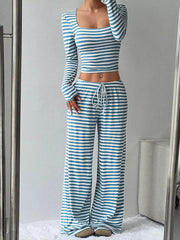 Blue and white striped two-piece set with crop top and drawstring pants