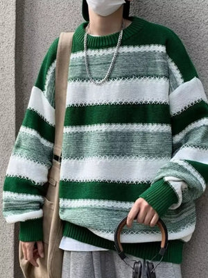 Relaxed fit green and white striped sweater with textured details and crew neck.
