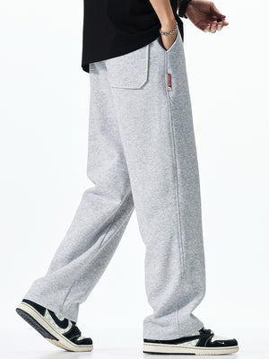 Men's grey casual loose-fit drawstring sweatpants with a back pocket detail.