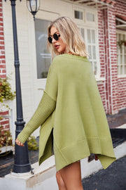 Lime acrylic knit sweater with asymmetric hemline and ribbed sleeves.