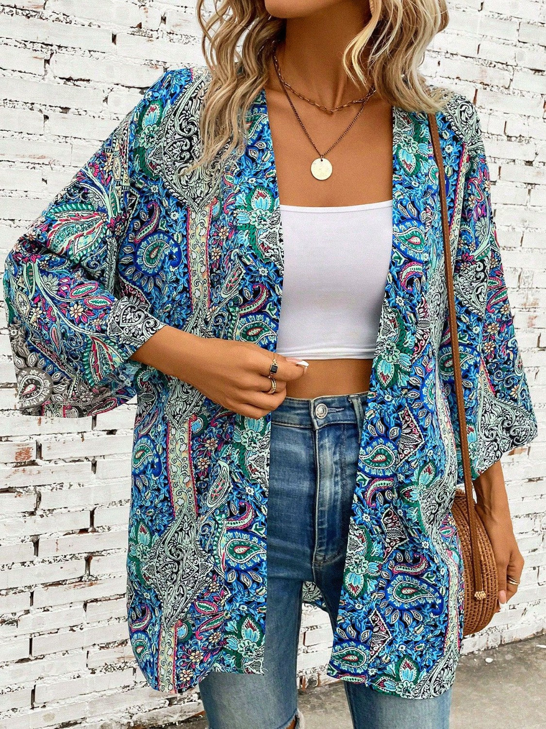 Teal paisley print kimono sleeve duster with open front and wide sleeves.
