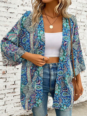 Teal paisley print kimono sleeve duster with open front and wide sleeves.