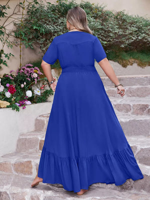 Blue V-neck maxi dress with short sleeves, smocked waist, and ruffled hem.