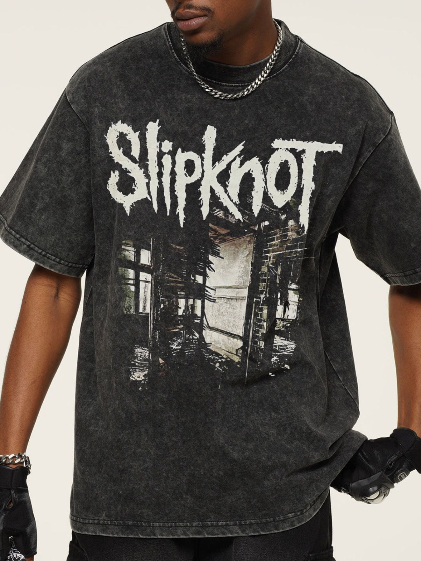 Men's dark gray distressed graphic t-shirt with crew neck and short sleeves.