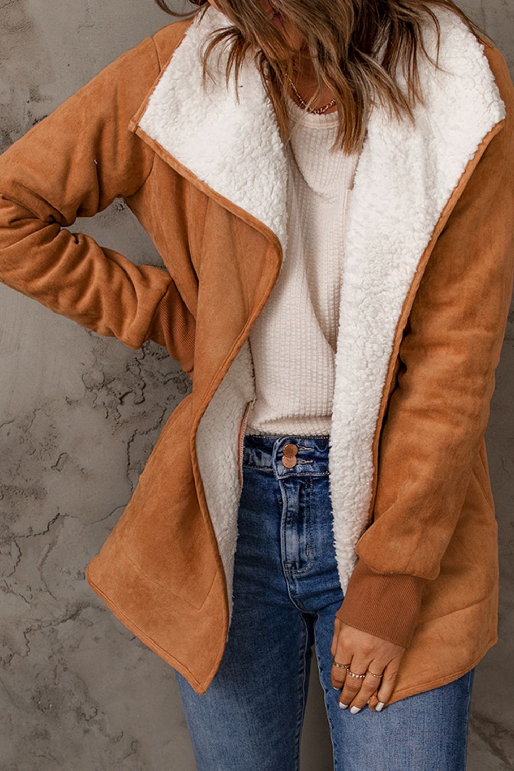 Caramel suede-effect jacket with white sherpa collar and cuffs, open front.