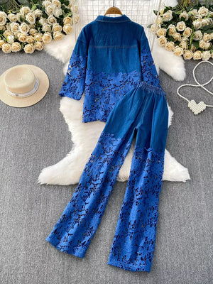Blue two-piece denim set with lace sleeves and pant legs, collared button-up jacket