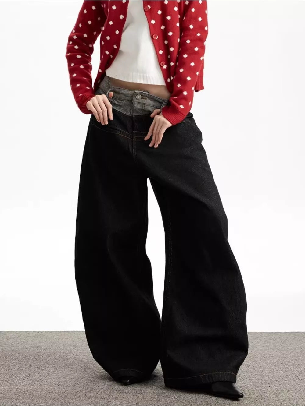 Layered double waist wide leg jeans in dark wash cotton, with a relaxed fit and flared leg.
