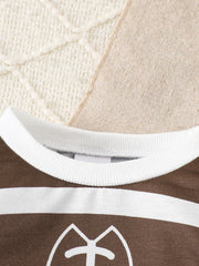 Brown and white striped baby top with football graphic and white ribbed neckline.