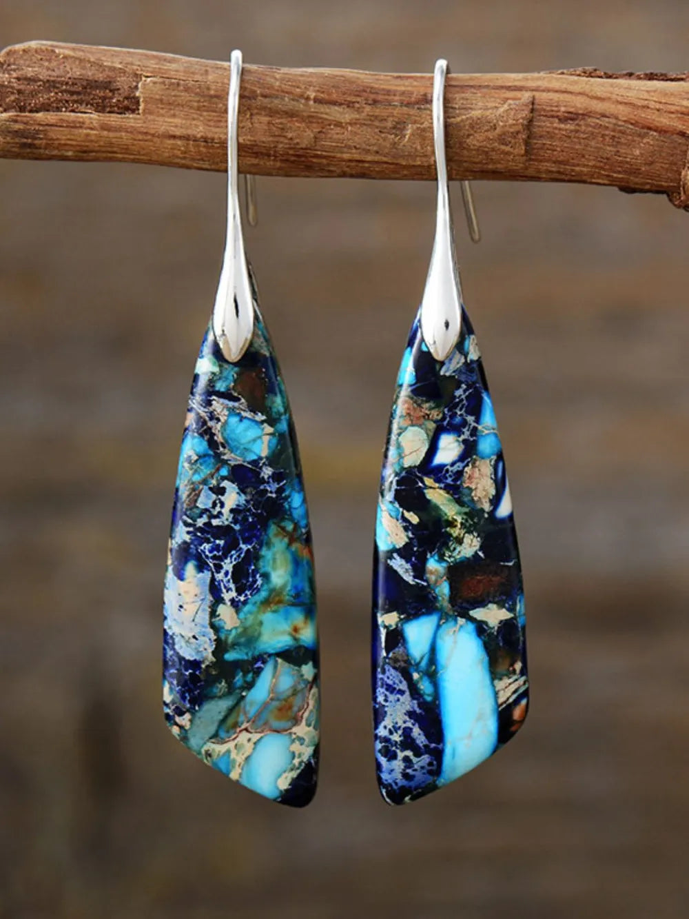 Azure Stone Teardrop Earrings with silver hooks and blue/gold marbled stone detail.