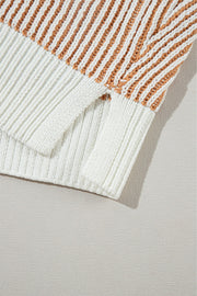 Vertical stripe knit sweater with camel and white stripes and side slits.