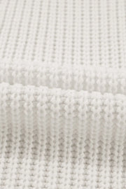 Ivory acrylic knit cardigan with textured stitch detail