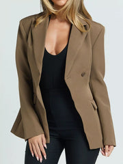 Brown single-button blazer with lapel and notched collar, worn open over black top.