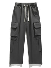 Grey cargo pants with drawstring waist and multiple button-flap pockets.