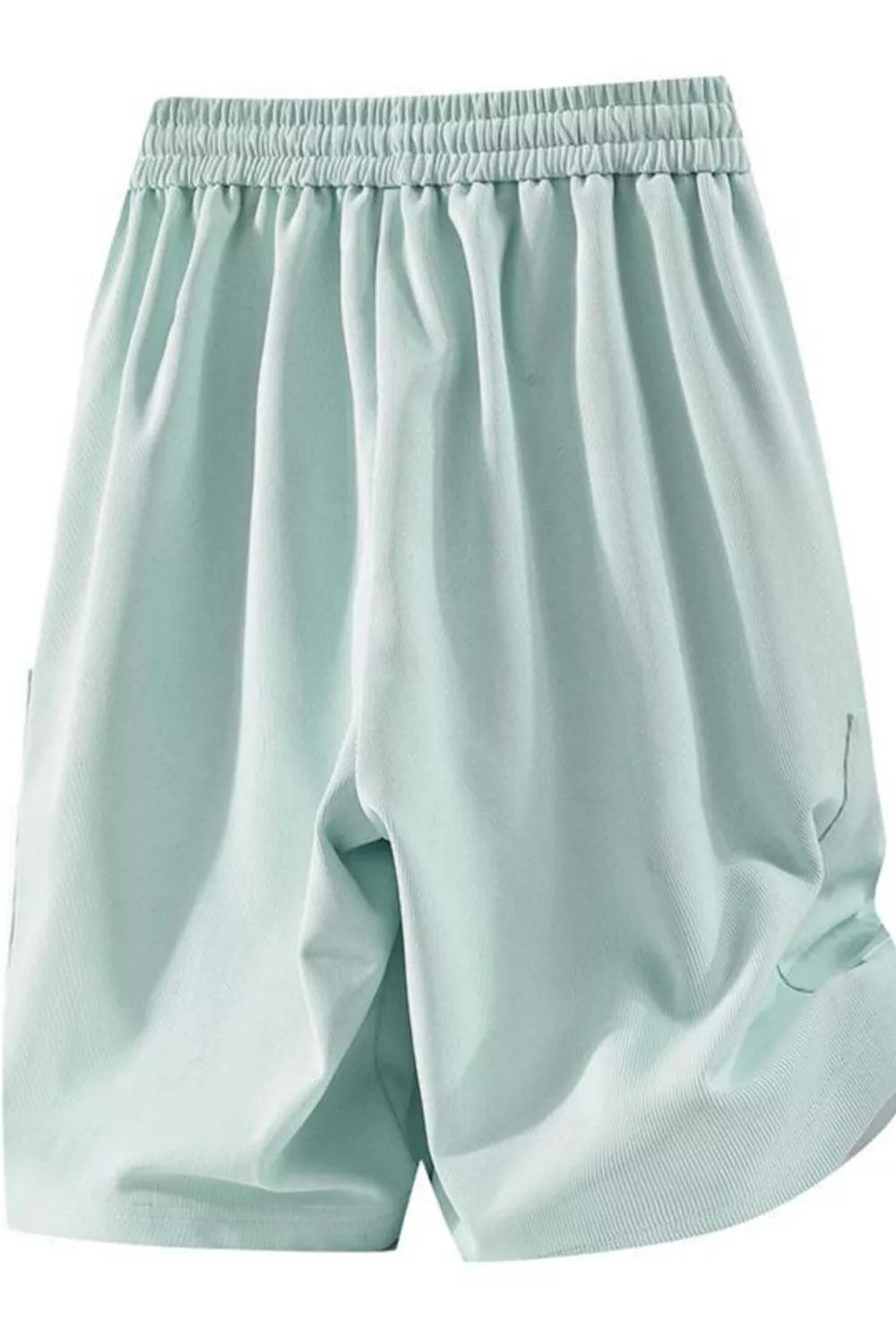 Relaxed fit sage chino shorts with drawstring waist and pockets.