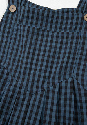 Textured dark blue gingham overalls with button detail and pocket