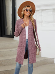 Textured ribbed knit duster cardigan in dusty rose with open front and pockets.