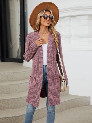 Textured ribbed knit duster cardigan in dusty rose with open front and pockets.