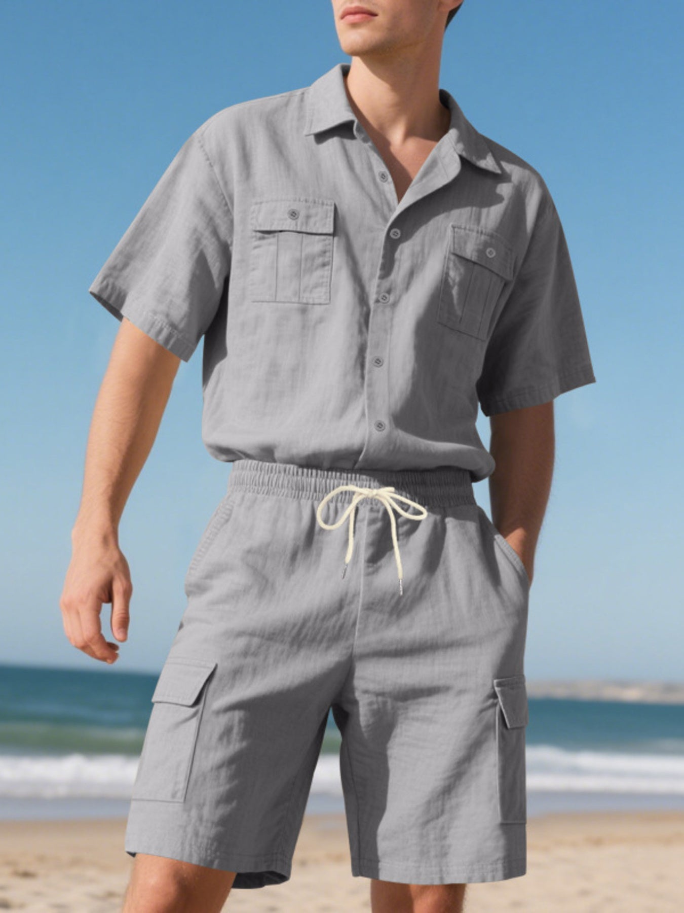 Grey relaxed-fit button-up shirt and drawstring cargo shorts set for men.