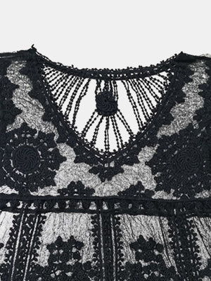 Black embroidered crochet kaftan cover-up with intricate floral details and a V-neckline.
