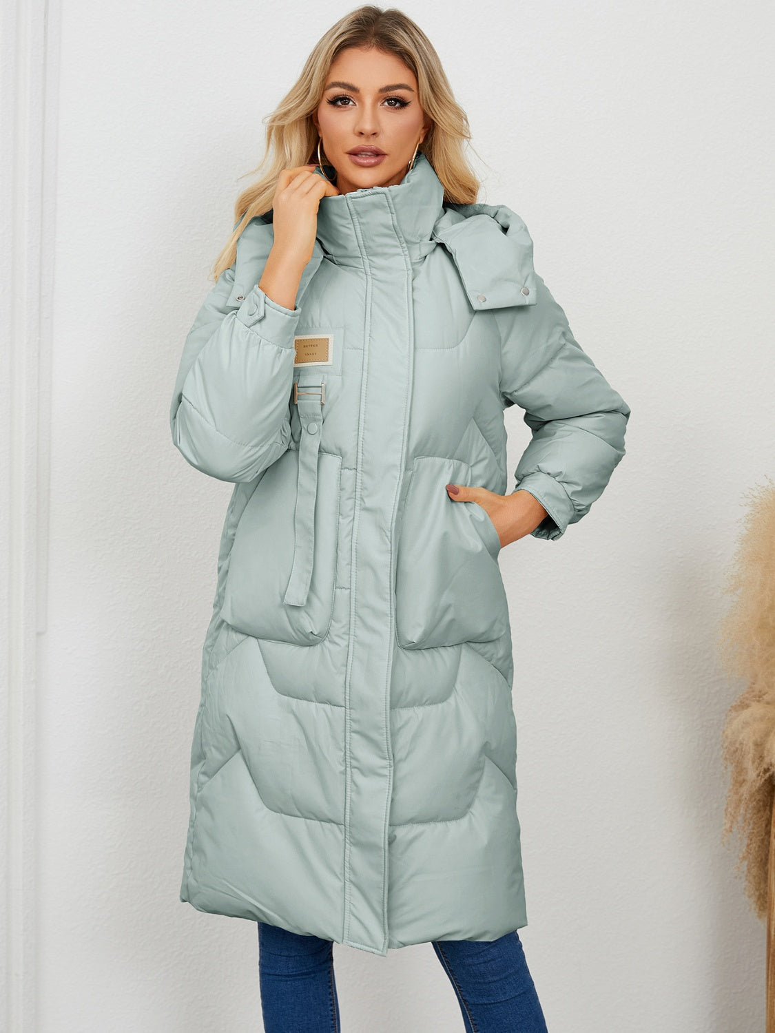 Sage quilted puffer parka with buckle detail and hood