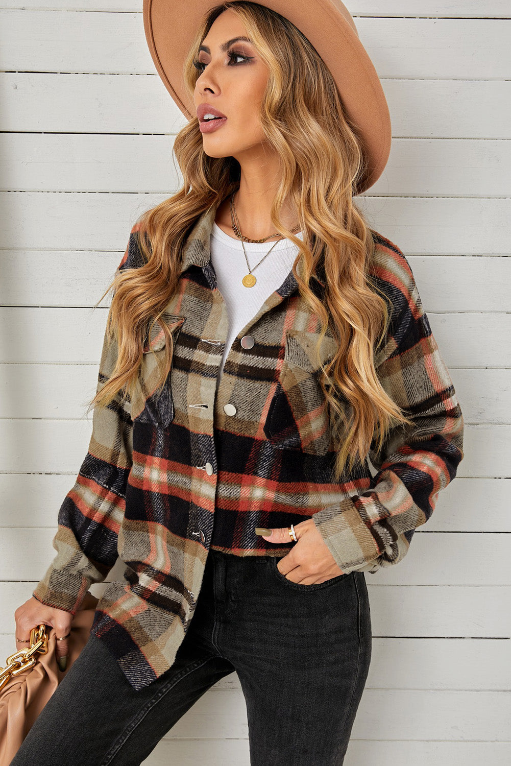 Relaxed plaid shacket with patch pockets in blue/orange and khaki tones.