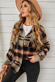 Relaxed plaid shacket with patch pockets in blue/orange and khaki tones.