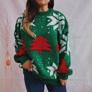 Green acrylic knit sweater with red Christmas tree appliqué and white snowflake details.