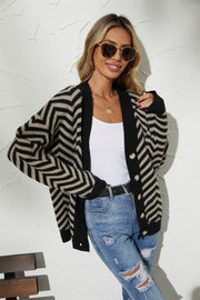 Chevron knit button-down cardigan in black and tan with a V-neck and button closure.