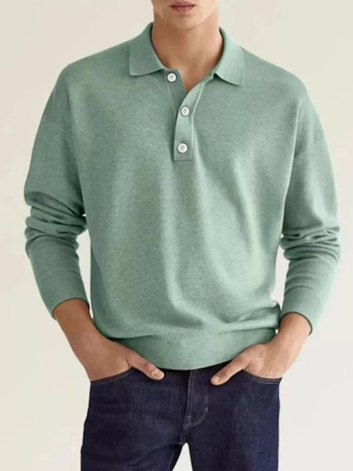 Sage knit polo shirt with button placket and relaxed fit.