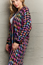 Chromatic crochet maxi cardigan with fringe detail in black with multi-color weave.