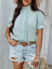 Light Green seersucker blouse with ruffles, puff sleeves, and button front.