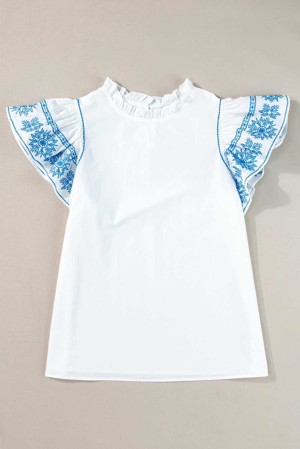 White ruffle neck blouse with embroidered flutter sleeves
