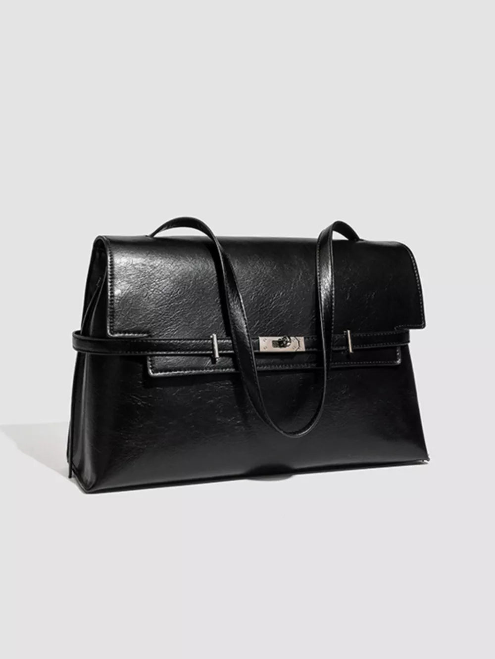 Elegant black pu leather shoulder bag with silver buckle detail