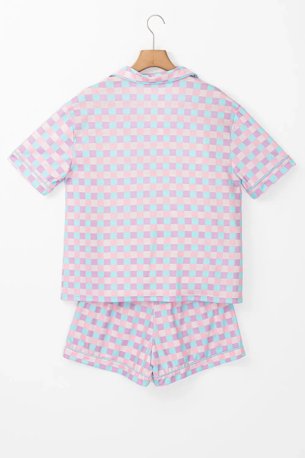 Pastel checkered pajama set with collared short sleeve top and shorts.