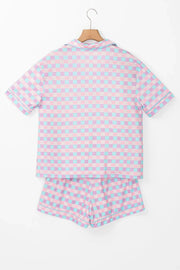 Pastel checkered pajama set with collared short sleeve top and shorts.