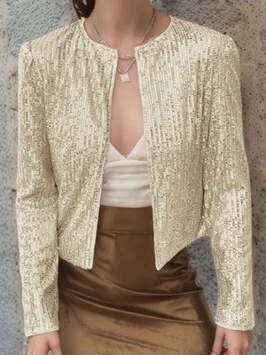 Gold sequin bolero jacket with a round neckline and long sleeves.