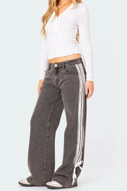 Side stripe wide-leg denim trousers in mocha with white stripes and tie detail at hem.
