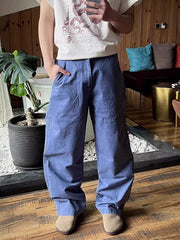 Men's relaxed fit blue sweatpants with pockets, casual everyday style.