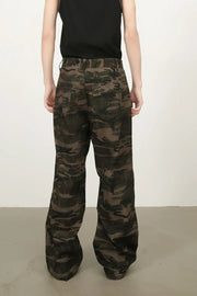Camo wide-leg utility trousers in green camouflage with cargo pockets.
